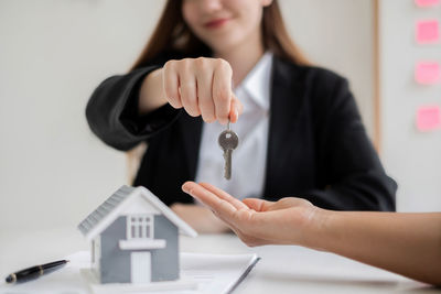 Midsection of woman working in office