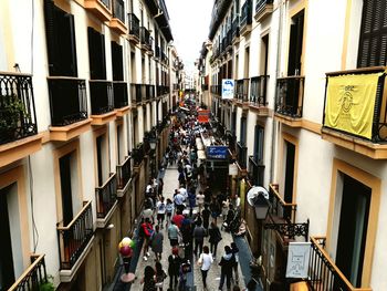 People walking on street in city