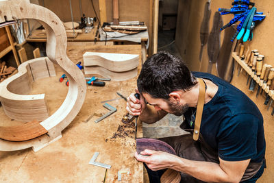 Man working on wood