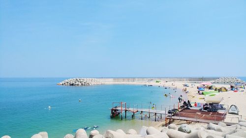 Scenic view of sea against clear blue sky