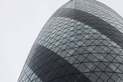 Low angle view of skyscraper against clear sky