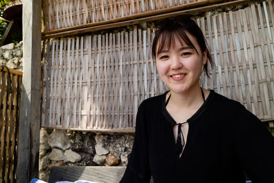 Portrait of smiling young woman