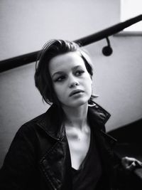 Portrait of young woman looking away