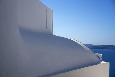 Close-up of boat against clear blue sky