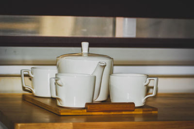 Close-up of coffee cup on table