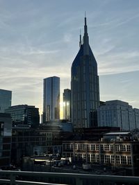 Buildings in city against sky