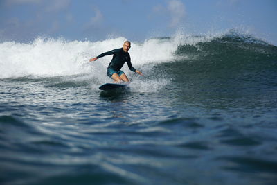 Man surfing in sea