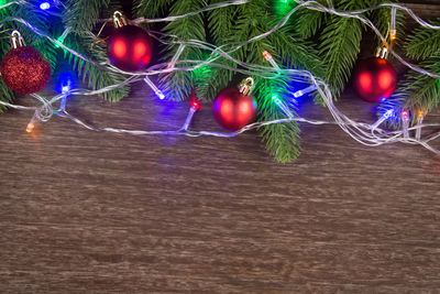 Close-up of illuminated christmas decorations on tree
