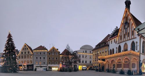 Street amidst buildings against sky