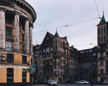View of buildings in city against sky