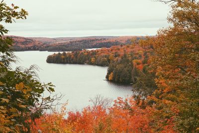 Scenic view of lake against sky during autumn