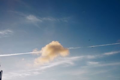Low angle view of vapor trail in sky