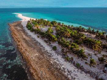 High angle view of sea at beach against sky