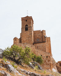 Low angle view of historic building against sky