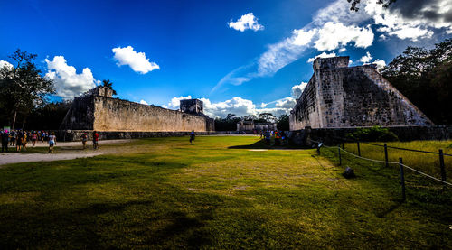 View of buildings against cloudy sky