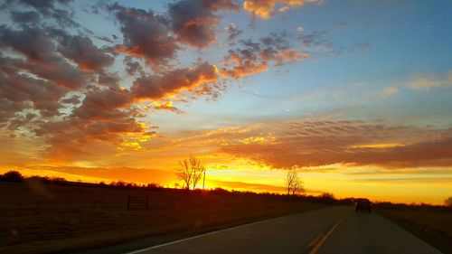 Road against sky during sunset