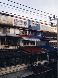 Low angle view of buildings against sky in city