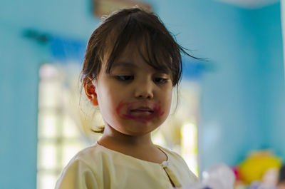 Close-up portrait of cute girl