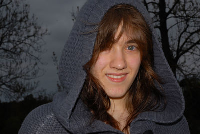 Portrait of smiling woman in snow