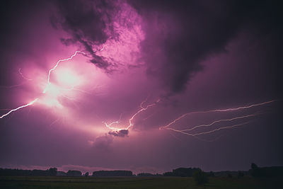 Low angle view of lightning at night