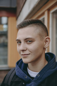 Close-up portrait of a smiling young man