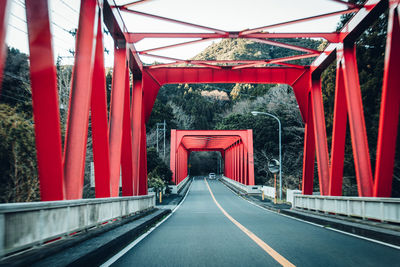 Old red bridge - driving rural japan - view from car window