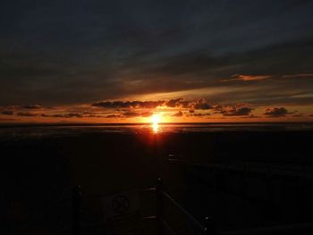 Scenic view of dramatic sky during sunset