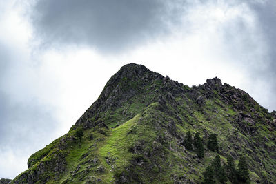 Low angle view of mountain against sky