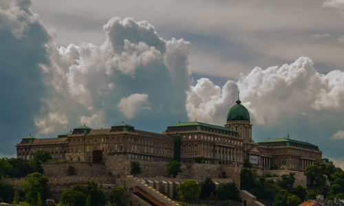 Built structure against cloudy sky