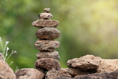 Close-up of stone stack on rock