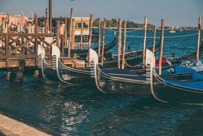 Boats moored in sea