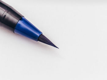 High angle view of pen against white background