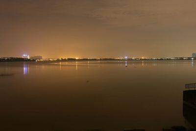 Scenic view of sea against sky at night