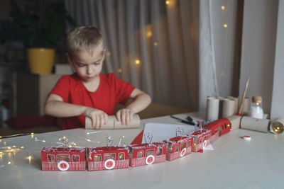 Boy playing chess at home