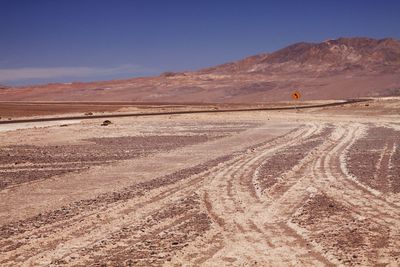 Scenic view of desert against sky