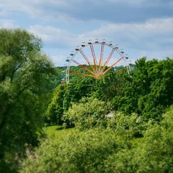 Low angle view of ferris wheel against sky