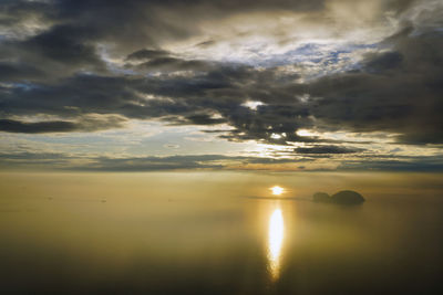 Scenic view of sea against dramatic sky