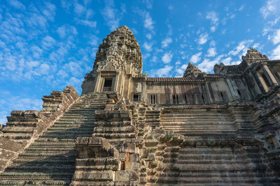 Angkor wat temple seen across the lake in siem reap at cambodia.