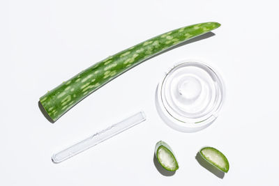 High angle view of pills on white background