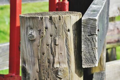 Close-up of wooden post on fence