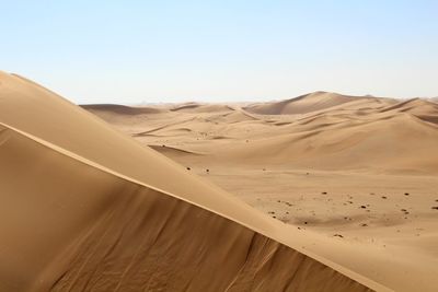 Scenic view of desert against clear sky