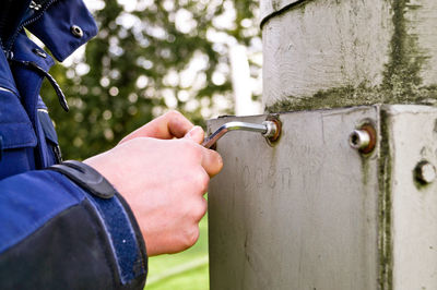 Close-up of man holding hands