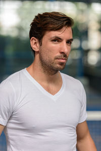 Portrait of young man looking away