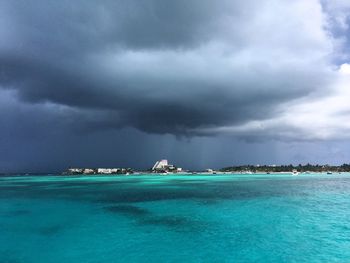 Scenic view of sea against cloudy sky