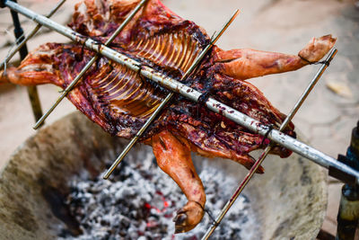 Close-up of meat on barbecue grill