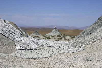Panoramic view of desert against sky