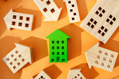 Wooden houses in a orange background 