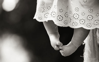 Children bare feet child's healthy bare feet on black and white background baby tiny toddler's feet
