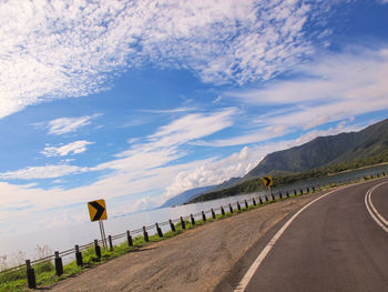 Empty road along landscape