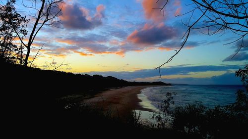 Scenic view of sea against sky at sunset